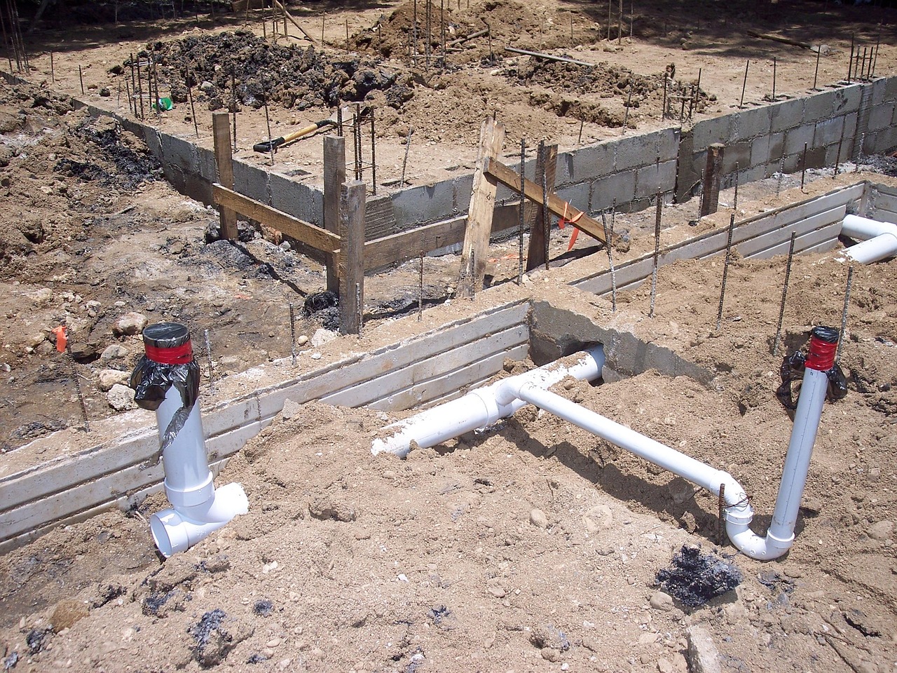 services-01 plumbing, cement, foundation, building, construction, concrete, belize, central america, house, home, sewer, bathroom, site, ground, dirt, in ground, third world, brown bathroom, plumbing, plumbing, plumbing, plumbing, plumbing, sewer, sewer